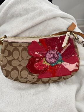 Coach Brown Signature Canvas Wristlet with Red Floral Appliqué